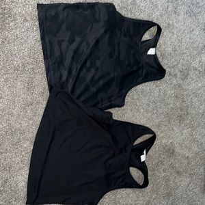2 black workout tanks